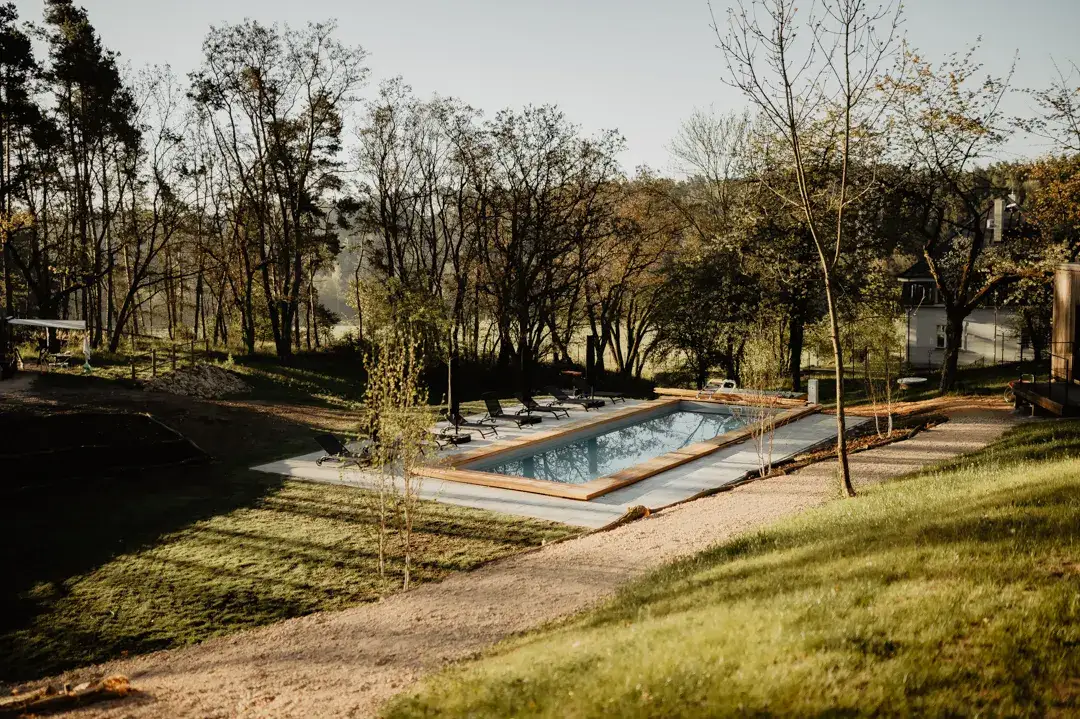 A quiet part of the grounds with a view of greenery.