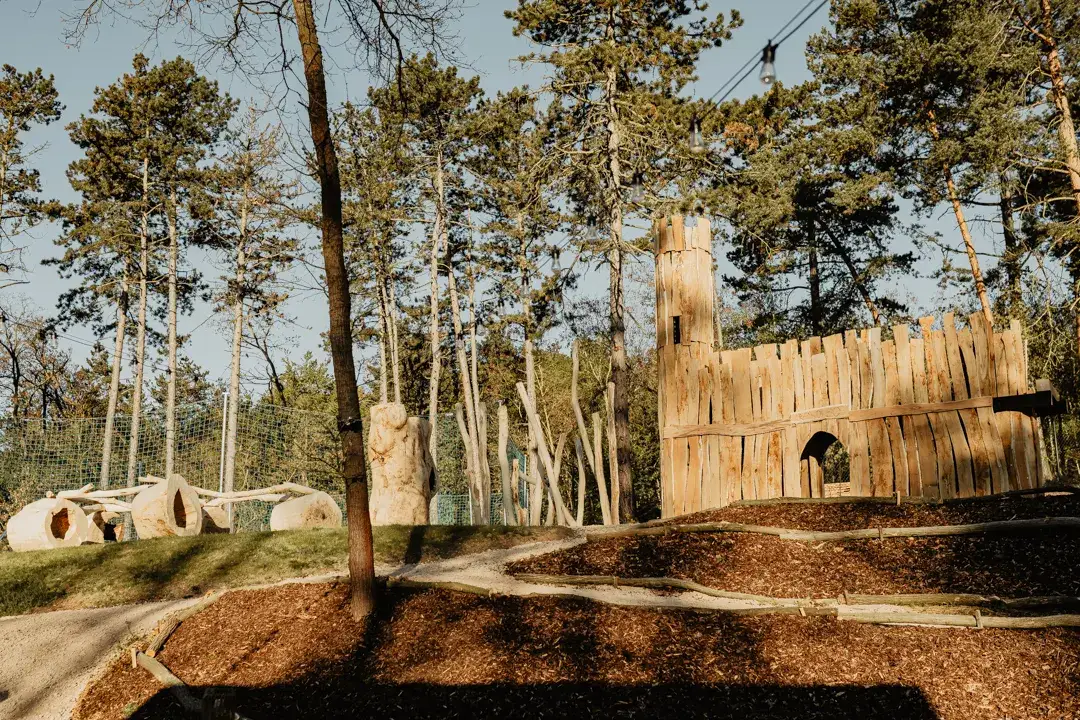 A grassy area and trees giving guests privacy.